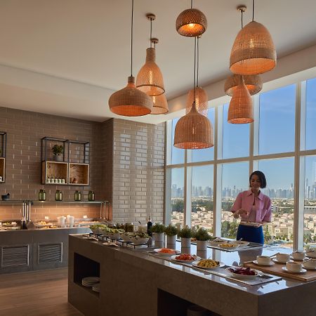 Novotel Jumeirah Village Triangle Дубай Екстериор снимка