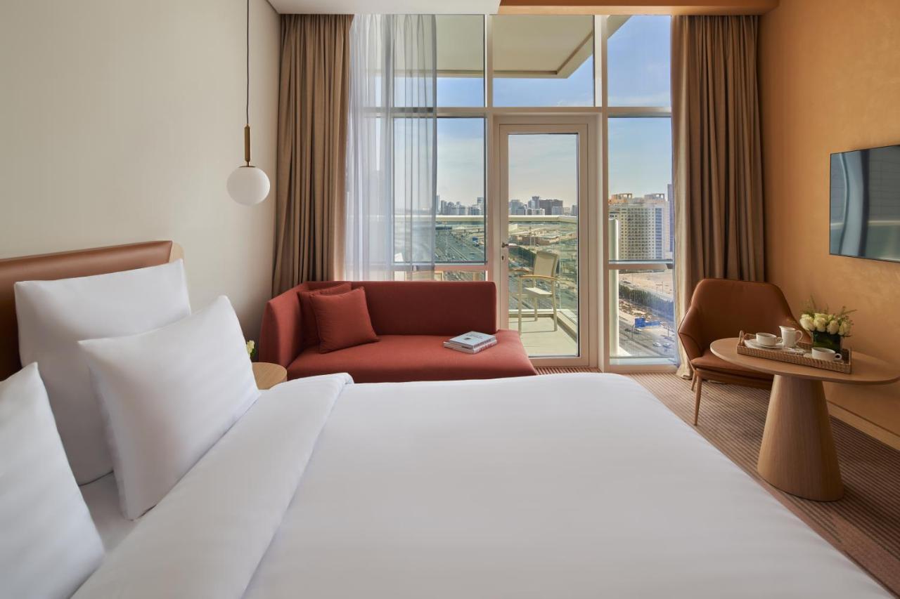 Novotel Jumeirah Village Triangle Дубай Екстериор снимка