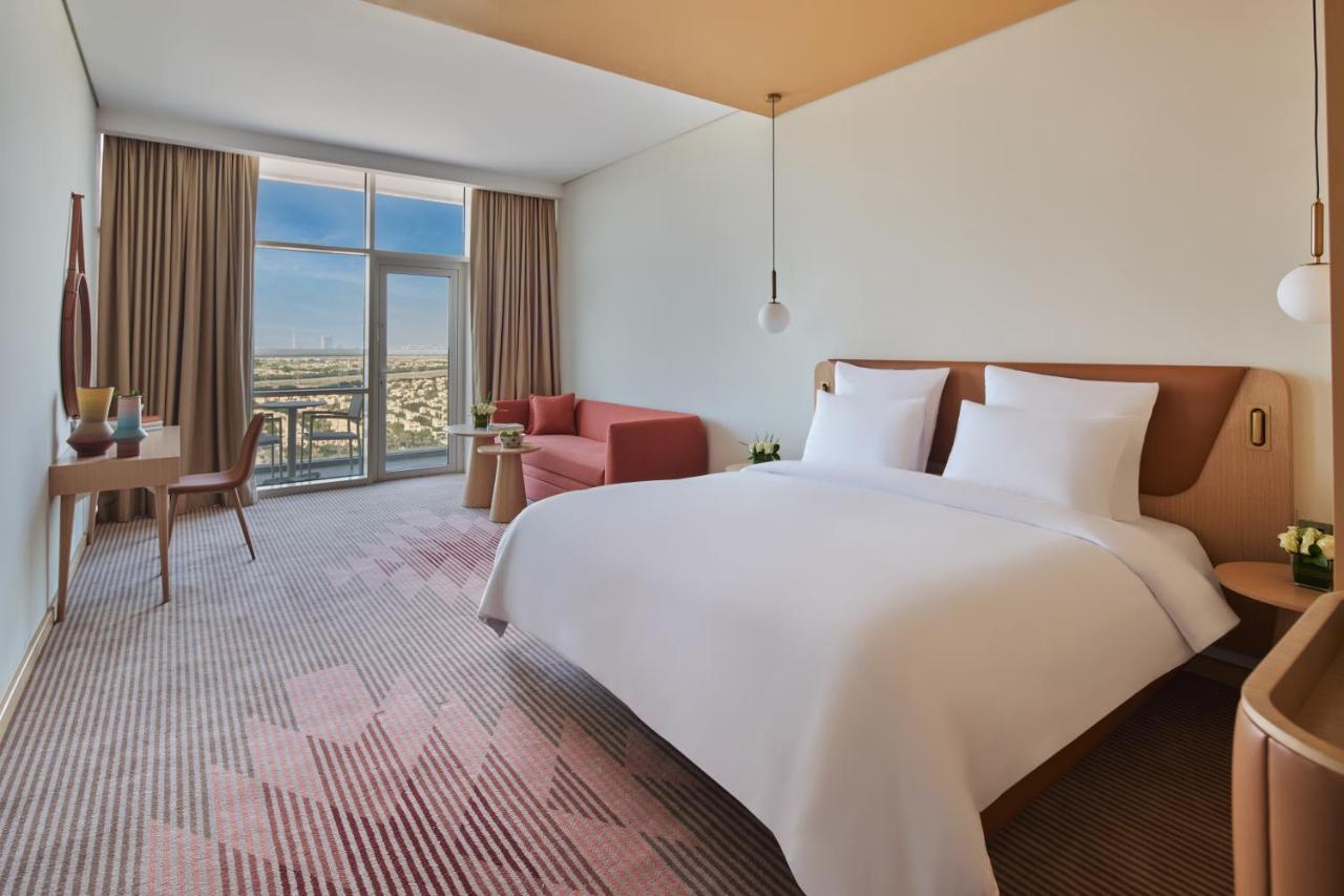 Novotel Jumeirah Village Triangle Дубай Екстериор снимка