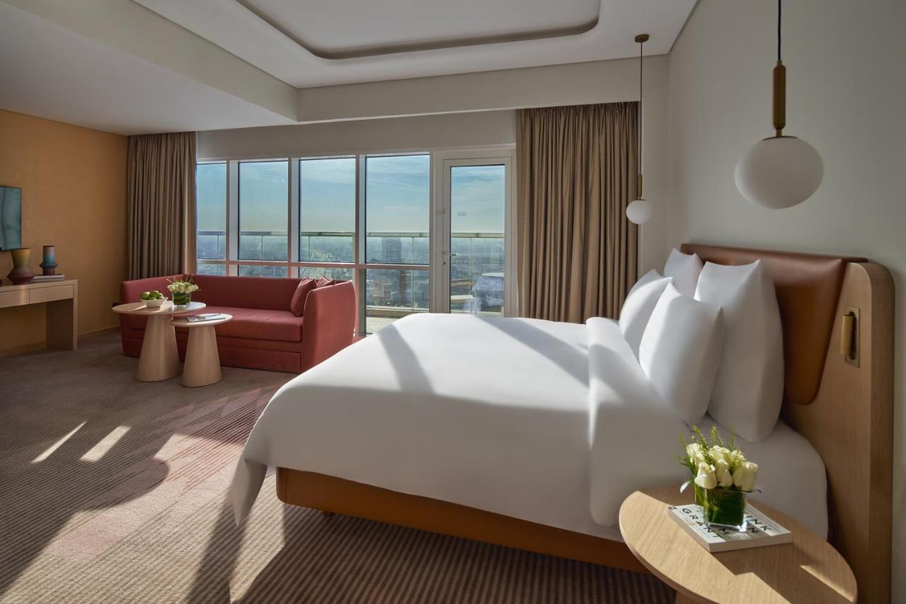 Novotel Jumeirah Village Triangle Дубай Екстериор снимка