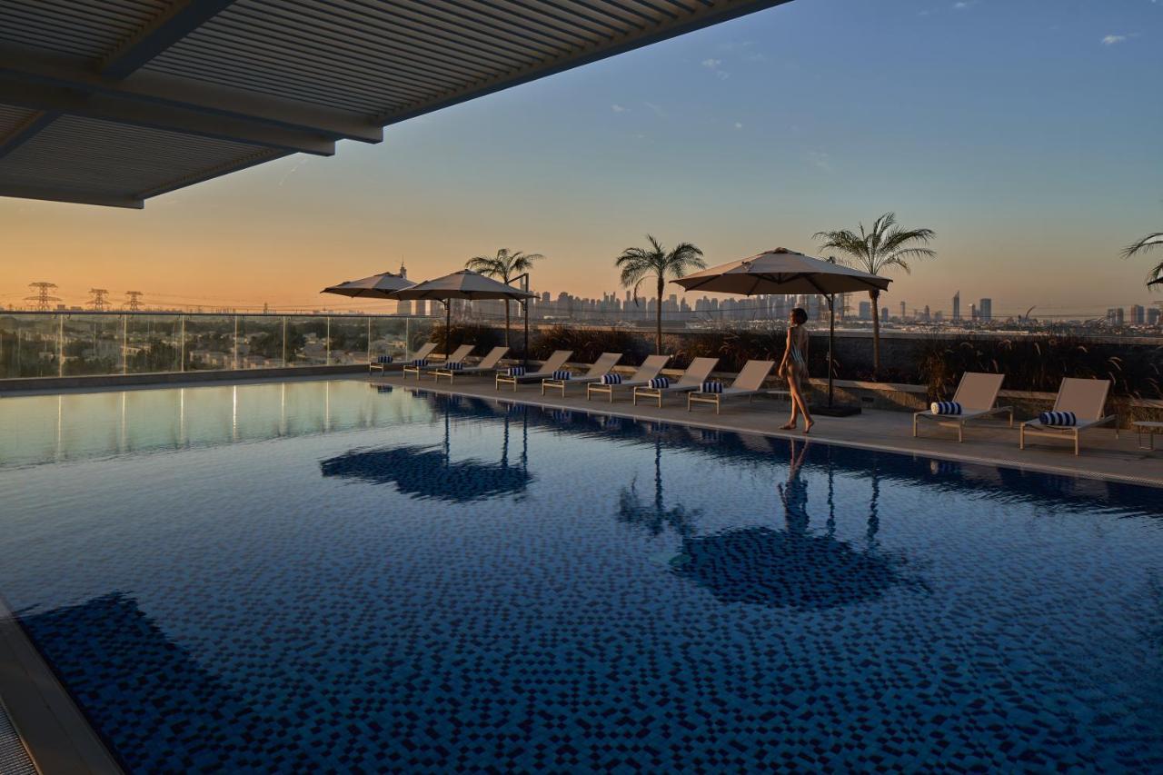 Novotel Jumeirah Village Triangle Дубай Екстериор снимка