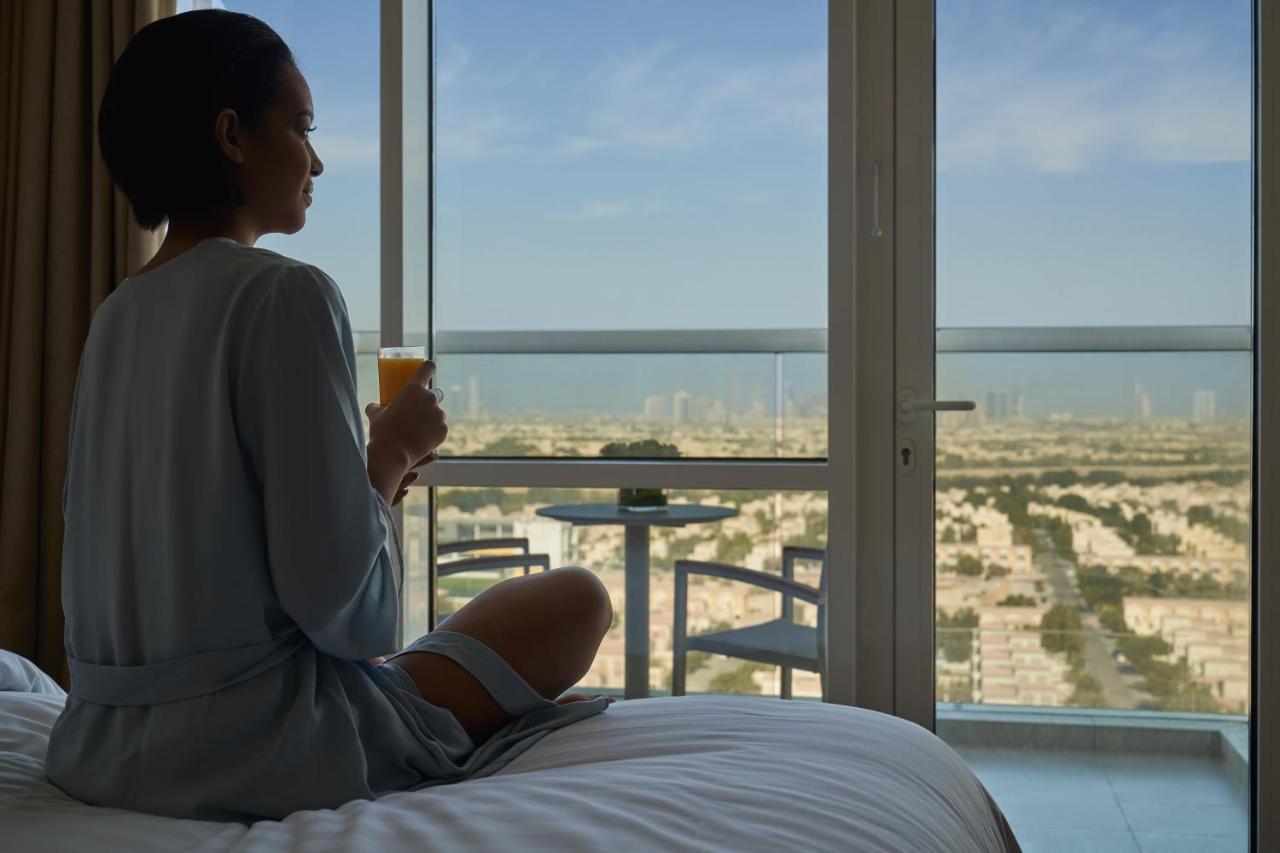 Novotel Jumeirah Village Triangle Дубай Екстериор снимка