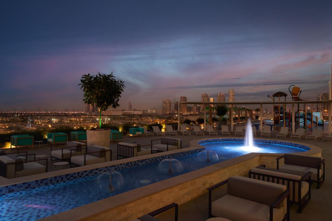 Novotel Jumeirah Village Triangle Дубай Екстериор снимка