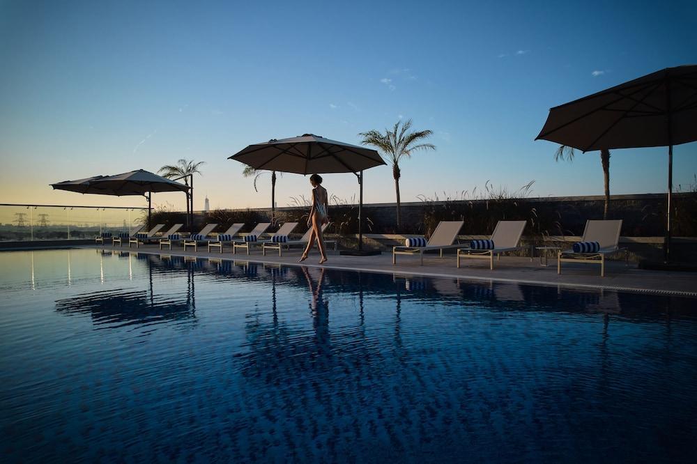 Novotel Jumeirah Village Triangle Дубай Екстериор снимка