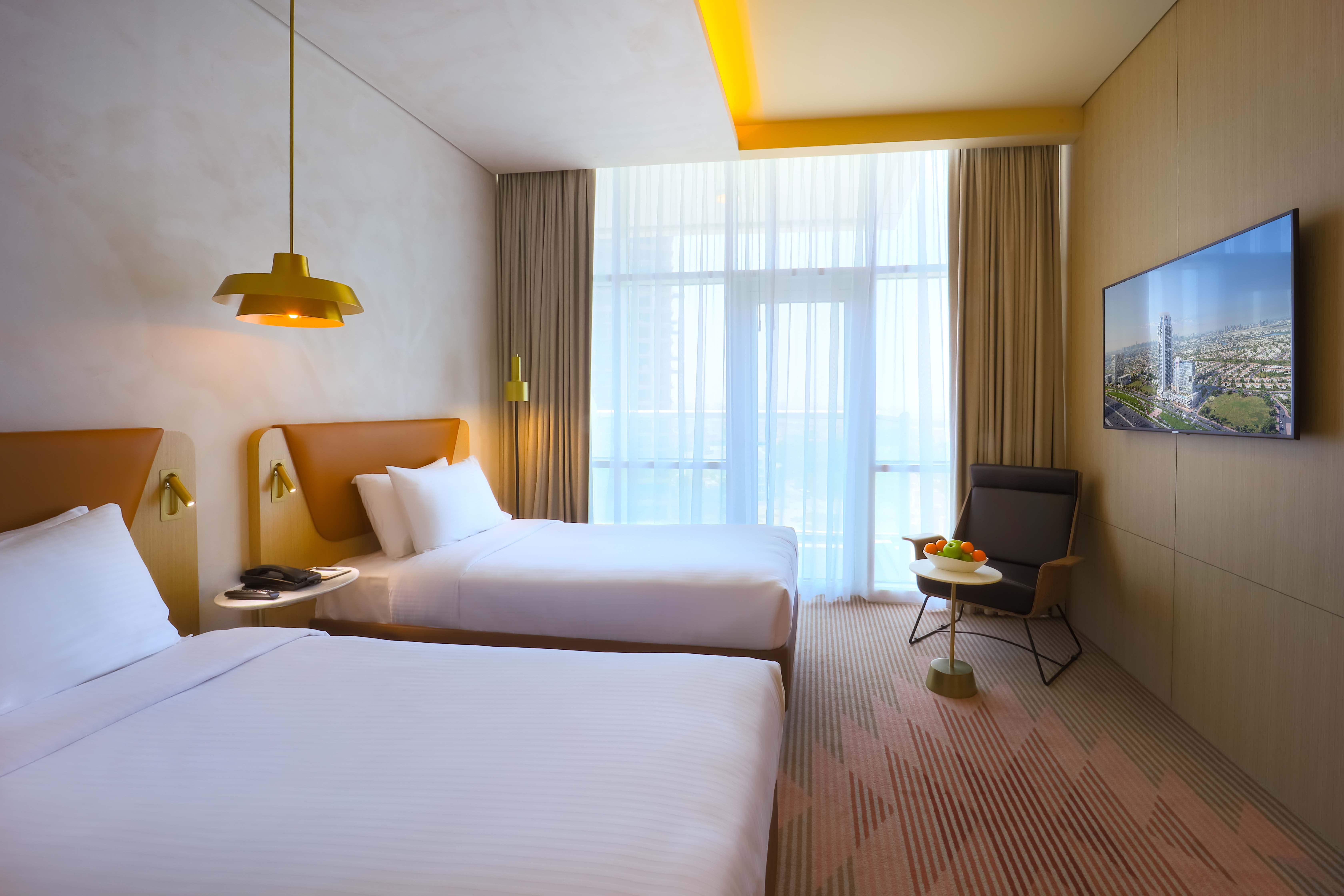 Novotel Jumeirah Village Triangle Дубай Екстериор снимка