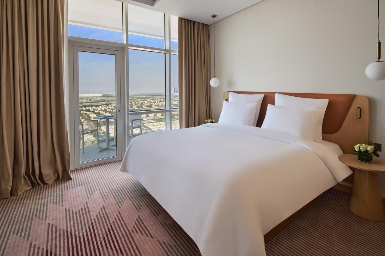 Novotel Jumeirah Village Triangle Дубай Екстериор снимка